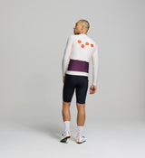 Rear view of almond Classic Jersey – breathable rear construction with three-pocket layout and silicone gripper at the hem to keep the jersey in place on long rides.