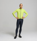 Front view of male cyclist in electric lime Midweight Jersey – articulated fit with moisture-wicking thermal knit and SAB two-way zipper for airflow control in changing weather.