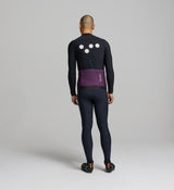 Rear view of men’s black cycling jersey – four rear pockets with side-wrap access, reflective logo detailing, and silicone hem gripper to keep the jersey in place.