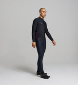 Side profile of black men’s thermal jersey – fast-drying, stretch thermal fabric with a sculpted silhouette ideal for layering under gilets or jackets in cold weather.