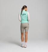 Rear view of Classic LITE gilet in mint – three reinforced rear pockets, reflective logo, and breathable back panel designed for real-world utility and multi-season performance.