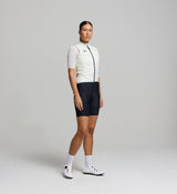 Side view of porcelain women’s cycling vest – lightweight construction with elasticated armholes and breathable mesh back panel for versatile all-season layering.
