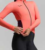 Close-up of soft brushed thermal fabric and SAB two-way zipper – breathable insulation meets adaptive ventilation with detailed stitching for seasonal cycling comfort and durability.