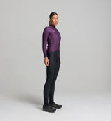 Side view of women’s aubergine long sleeve cycling jersey – midweight construction with fast-drying technical fabric and stretch fit for layering under jackets.