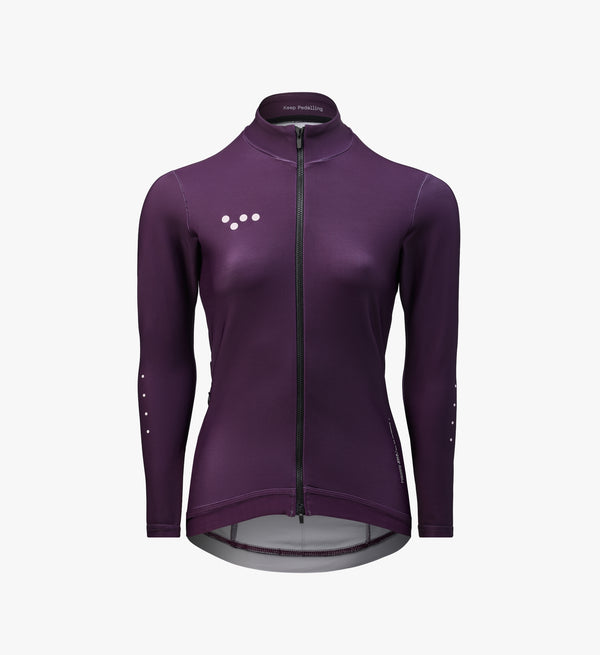 Women’s aubergine thermal long sleeve cycling jersey – breathable winter layer with brushed thermal interior and moisture-wicking fabric for cold-weather performance.