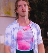 Detail of Floral Men's Air Base Layer - Cosmos mesh fabric and neckline binding, showcasing durable construction and sweat-wicking texture