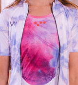 Close-up of Floral Women's Air Base Layer - Cosmos fabric texture, showing lightweight mesh and flatlock seams that prevent chafing on long rides