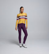 Front view of cyclist wearing the Women's Classic LS Jersey in Sunflower – sleek, form-fitting, and sun-protective for cool weather rides