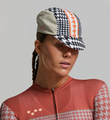 Detail of the cycling cap’s curved brim, ideal for reducing glare, wicking away moisture, and keeping riders focused on the road ahead.