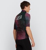 Side view of Men's Pro Deflect Gilet in Interweave Pine, showing the fit and flexibility with 4-way stretch panels