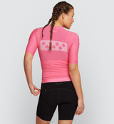 Back view of the Pink Pursuit Air Cycling Jersey, highlighting three reinforced back pockets for secure storage