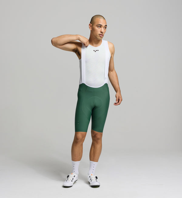 Front view of male cyclist in Pine SuperFIT 2.0 Bib Shorts – showcasing aerodynamic fit and ventilated brace structure