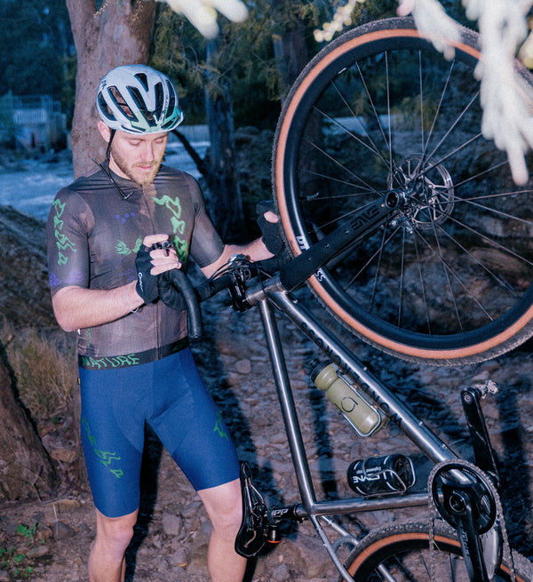 Model wearing Men's Training Bib Short in Dusk – clean front view showcasing performance fit