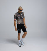 Side profile of Men’s Training Jersey – Dusty, showing ventilated mesh panels and ergonomic shaping.