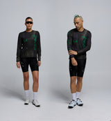 Front view of rider in Acid Black Tech Tee, showing lightweight fabric and versatile, all-terrain silhouette.