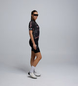 Side profile of Wild Forest Training Jersey showing contoured shape, perforated panels, and signature Pedla styling.