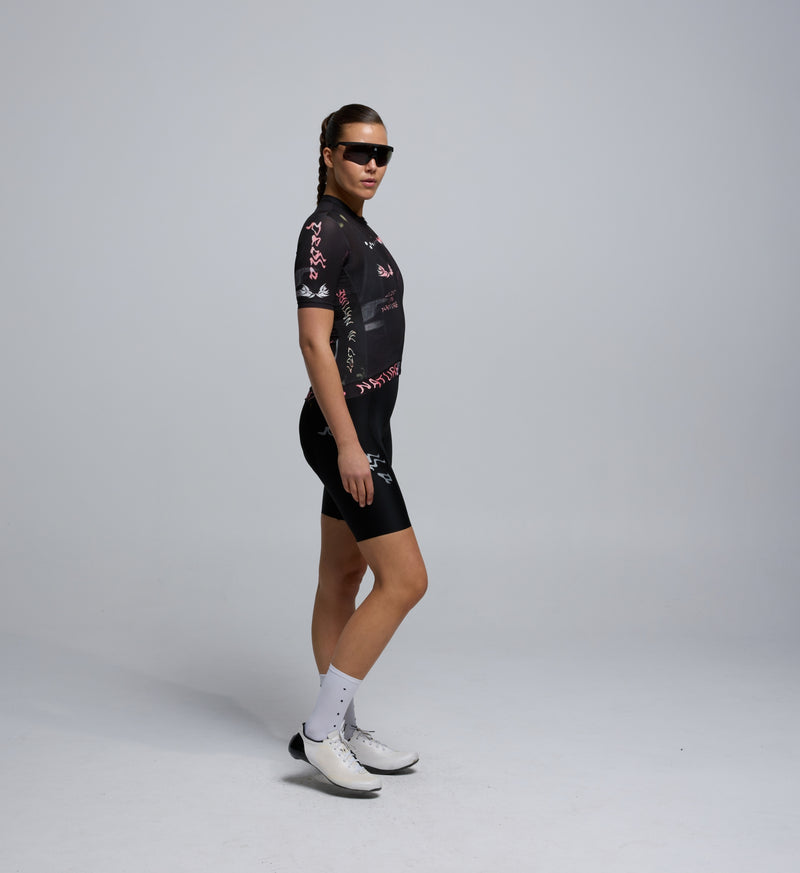 Side profile of Wild Forest Training Jersey showing contoured shape, perforated panels, and signature Pedla styling.