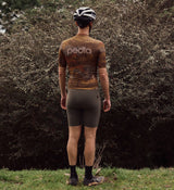 Back view of NatureCAMO Men's Cycling Jersey in Auburn on model, featuring silicone gripper hem, ergonomic design, and stretch fit to keep the jersey in place during intense cycling sessions and road training.