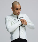 Close-up of the Italian 3-layer breathable laminate and waterproof SAB® zipper on the Men's Deflect 2.0 Cycling Jacket – Porcelain, highlighting fully sealed seams and premium construction.