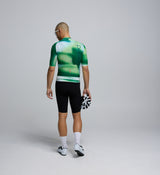Back view of the Men's Pursuit 2.0 Cycling Jersey in AirFoils Green, featuring three lightweight reinforced rear pockets, reflective details, and a supportive race fit.