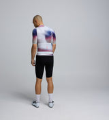 Back view of the Men's Pursuit 2.0 Cycling Jersey in AirFoils White, showing three lightweight rear pockets, reflective safety accents, and streamlined race fit design.