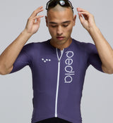 Close-up detail of the woven ultralight fabric and silicone sleeve gripper inside the Men's Pursuit AIR Cycling Jersey – Dusk, illustrating airflow texture and secure aerodynamic fit.