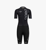 Front-facing product image of the Pedla Women's Pro Pursuit Crit Suit in black, showcasing its aerodynamic race-fit design, bonded cuffs, and premium woven fabric for high-performance cycling.