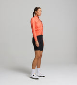 Profile view of the Women’s Pro Deflect 2.0 Cycling Jacket, highlighting the 4-way stretch woven fabric at the sides and undersleeves for flexibility and comfort.