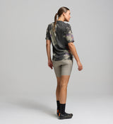 Back view of unisex cycling tech tee in light tone – UPF 50+ protection and integrated pocket-friendly design for gravel adventures