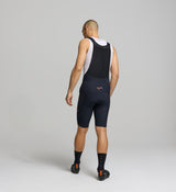 Back view of men’s SuperSYSTEM bib shorts – hydration pocket and hose channel built for long-distance performance and adventure riding