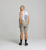 Back view of men’s SuperSYSTEM bib shorts with hydration system – rear brace pocket and hose channel for all-day hydration access
