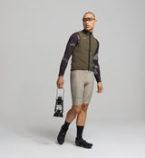 Side view of men’s long sleeve cycling jersey – ergonomic sleeves and hydration tube channel for long-distance riding comfort