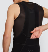 Close-up view of Pro Men's SuperFit Air Bib Shorts in Black on model, detailing the seamless construction, premium stretch-woven fabric, and reflective accents that provide comfort, durability, and visibility during road cycling.
