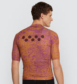 Back view of Men’s Air Cycling Jersey in Ginger - Reinforced lightweight back pockets and reflective accents