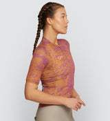 Side view of Women’s Air Cycling Jersey in Ginger - Lightweight fabric and extended sleeves