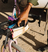 Topo Designs / Bike Bag Mini Mountain - Bone White Mini in use on a bike