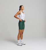 Side profile of Women's Pine SuperFIT 2.0 Bib Shorts – highlighting contoured fit, seamless cuff, and reflective detailing