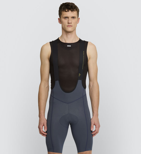 Pro Men’s SuperFit Cycling Bib Short - Ink: Evolution of comfort and performance for your next pursuit. Unleash your potential. Elite support for peak performance.