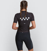 Core Women's Classic Cycling Jersey - Black, black bib short on beautiful model back.