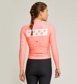 Bold Women's LunaPRISM Cycling Jersey - Coral. Lightweight, aerodynamic, and comfortable for fast rides.